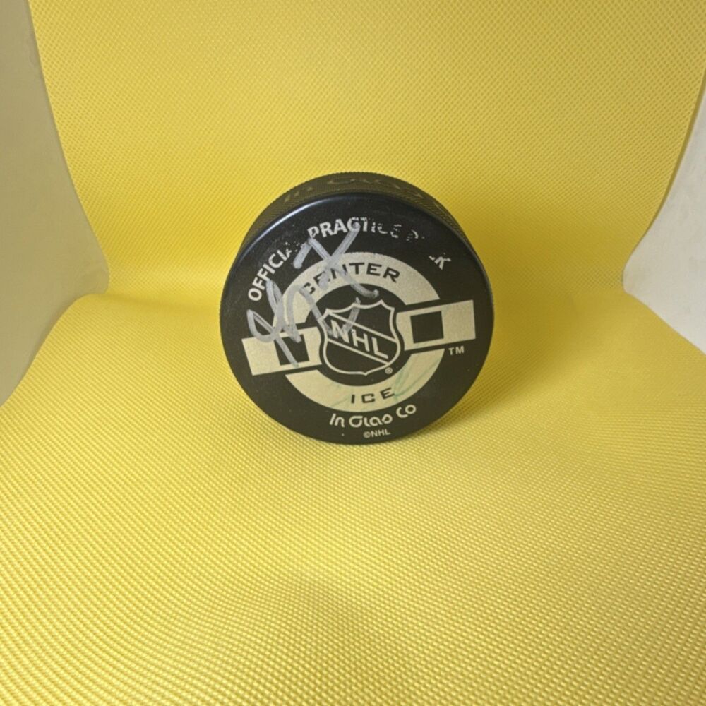 Autographed NHL Official Practice Hockey Puck In Glas Co Original